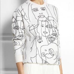 Stella McCartney “face” sweater.